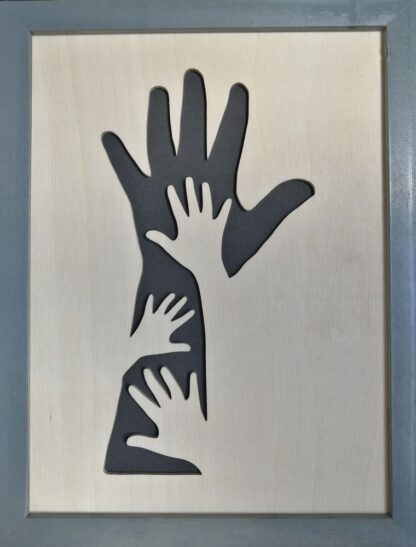 Cadre « mains dans main » fond noir, encadrement bois peint gris anthracite.